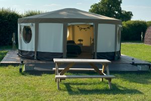 Pitch and Canvas | Glamping and Camping in Cheshire | Kopie tent and wooden bench